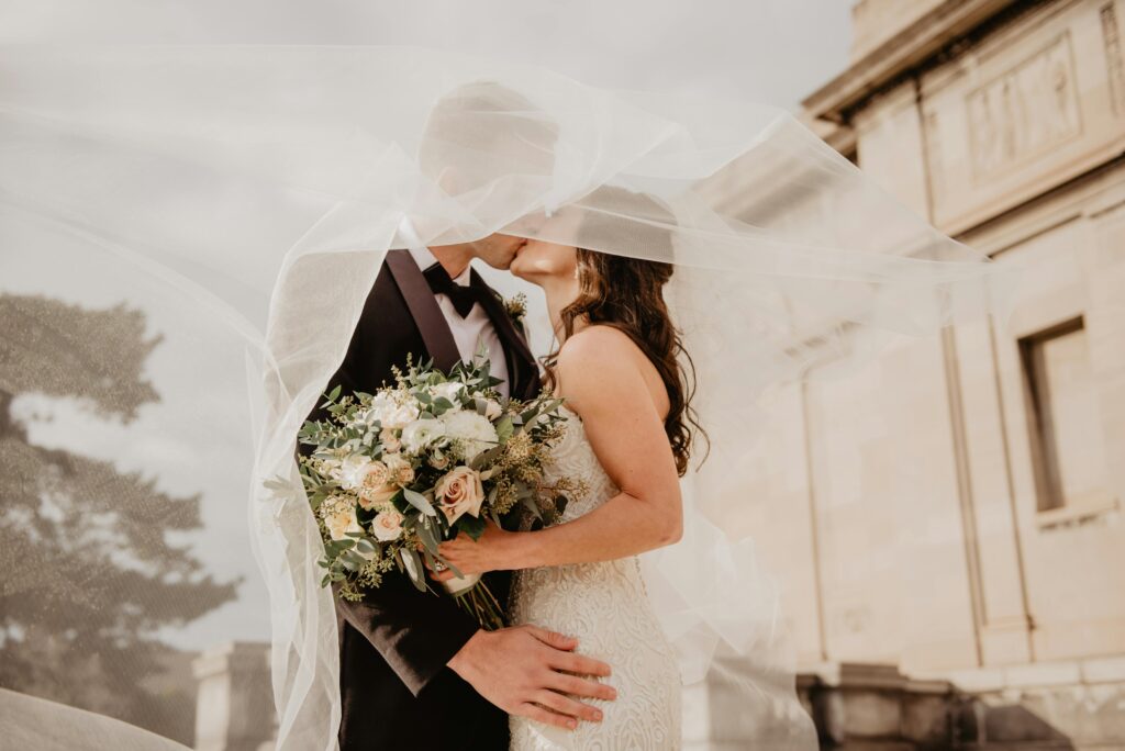 Wedding couple kissing  - a beautiful moment from weddings and events in Crete.