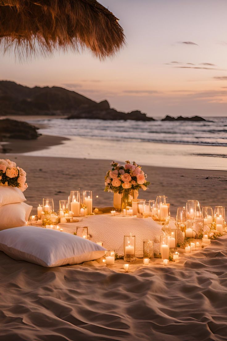 Sunset sea view proposal setup in Crete — cozy area with flowers, lit candles, and cushions for an unforgettable proposal experience.